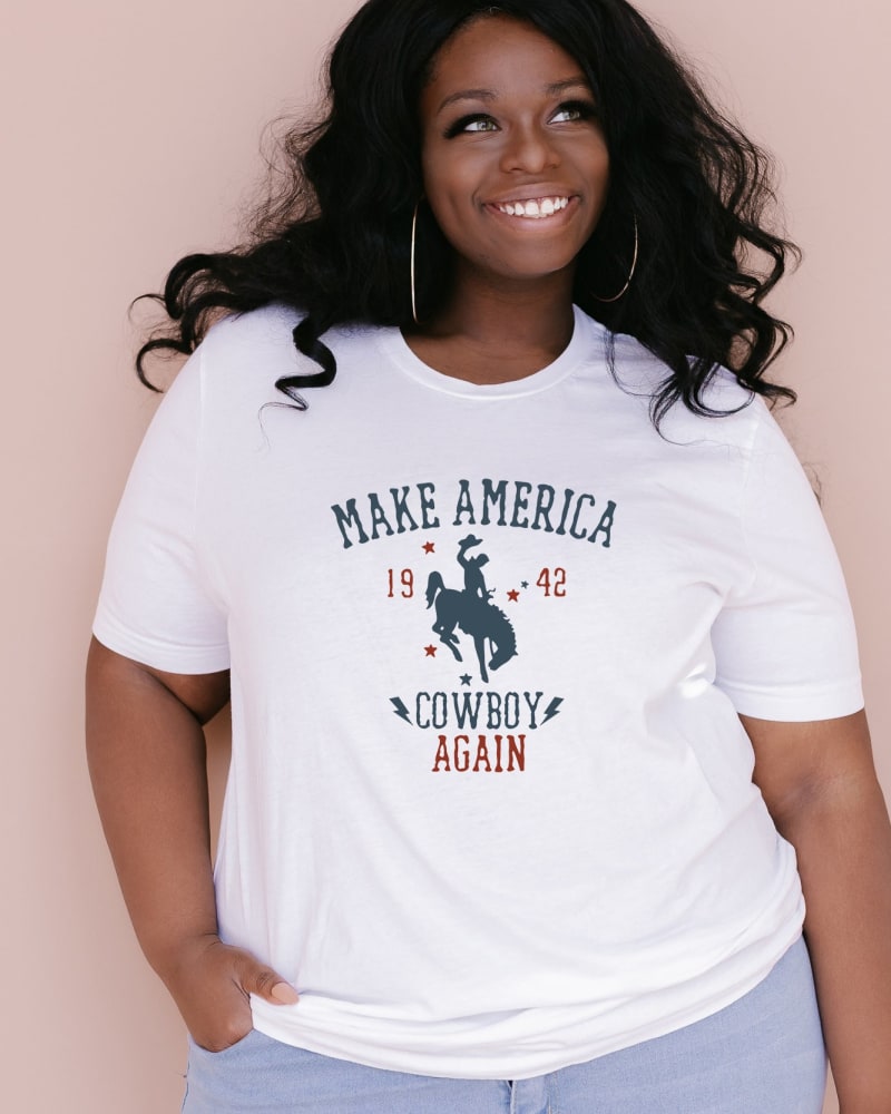 Front of a model wearing a size Large Made America Cowboy Again in White by Simply Sage Market. | dia_product_style_image_id:281397